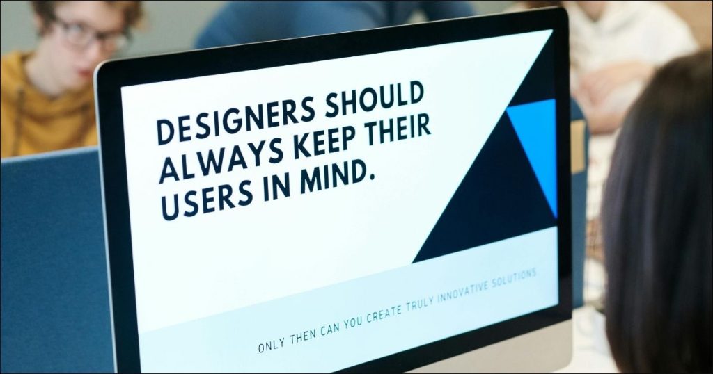 Computer screen displaying the message, “Designers should always keep their users in mind.”